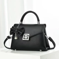 Elegant black lychee grain handbag with pearl bow pendant and silver square buckle - Black
