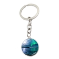 Detail of a silver circular keychain featuring a vibrant green aurora borealis glass pendant - Aurora Water Reflection (JY008215-8)