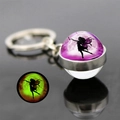 Detailed view of luminous butterfly fairy glass ball keychain with green glowing effect - Fairy and Full Moon Silhouette Style (JY008269-6)