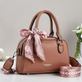 Brown leather Boston handbag with decorative pink scarf and printed shoulder strap - Pink