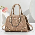 Detail of tan textured Boston bag with silver chain and FASHION & BAGS branding - Coffee