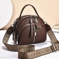 Deep brown textured faux leather crossbody bag with ethnic patterned woven strap - Coffee