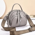 Gray lychee grain leather crossbody bag with multiple zippers and ethnic style strap - Gray