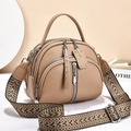 Fashionable khaki leather crossbody bag with multiple zippers and ethnic patterned strap - Light Khaki