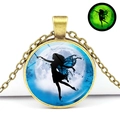 Close-up of vintage bronze fairy necklace showing the green glow-in-the-dark luminous effect - Moon Silhouette Style (JY008273-11)