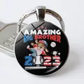 Close-up of baseball keychain with Amazing Big Brother dog design and US flag colors - Baseball Dog Style (JY008290-7)