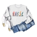 Flat lay of white nurse theme sweatshirt with coffee scrubs rubber gloves print detail - White (Black Letters)