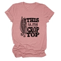 Detailed view of the 'THIS IS MY CROP TOP' corn print on soft pink cotton fabric - Lotus root pink