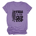 Detail of purple crop top featuring a pun corn graphic and THIS IS MY CROP TOP text - Purple (Black Text)