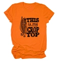 Flat lay of an orange cotton t-shirt with This is my Crop Top text and corn graphics - Orange