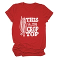 Detail of red t-shirt fabric featuring white THIS IS MY CROP TOP print with corn pun - Red
