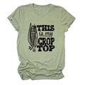 Detail of crop top print and grass green cotton fabric on summer crew neck t-shirt - Olive Green