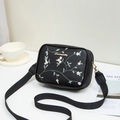 Black PU leather crossbody bag with pink floral embroidery and adjustable nylon strap - Black