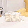 Borsa a tracolla con motivo geometrico giallo, catena dorata e dettaglio logo S - Bianco