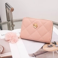 Pink quilted short wallet with gold flower buckle and soft pompom pendant for women - Pink