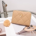 Beige quilted small wallet with plush pompom and gold flower charm for women - Khaki