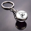Macro shot of Babylonian Priest double-sided glass pendant with vintage metal keyring - Babylonian Priest (JY008320-9)