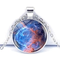 Macro shot of silver galaxy pendant with nebula pattern and domed glass cover - Blue Orange Galaxy (JY001051-10)