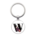 Détail d'un pendentif porte-clés rond avec lettre W fleurie et anneau en métal argenté - Style Lettre W (JY008388-W)