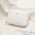 Quilted white crossbody square bag with a butterfly charm and wide textile shoulder strap - White