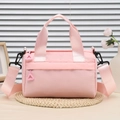 Borsa a mano cilindrica rosa in nylon con tracolla regolabile e doppi manici da donna - Rosa
