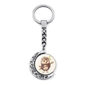 Detail of silver rotating crescent moon keychain featuring a cute hedgehog illustration - Branch Hugging Style (JY008501-10)