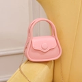 Pink mini jelly handbag with glossy finish and gold metal chain strap for women - Pink