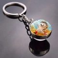 Cute hedgehog glass ball keychain with silver metal ring on a dark reflective surface - Carrying Basket Style (JY008498-8)