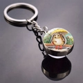 Detail of hedgehog keychain glass pendant with illustration on a reflective black surface - Umbrella in Rain Style (JY008498-6)