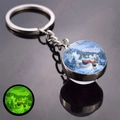 Glow-in-the-dark double-sided glass keychain with a snowy winter scene and green luminescence - Winter Church Bridge (JY008516-7)