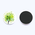 Detail view showing front and back of the tree of life glass magnet on a white surface - Fresh Green Birdcage Tree (JY008538-19)