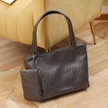 Dark brown tote bag with crocodile texture and matching pouch on a yellow sofa - Gray