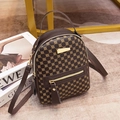Mini brown crossbody backpack with gold floral circle print and metallic hardware detail - Coffee
