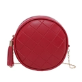 Red circular crossbody bag with diamond quilting, tassel detail and gold chain strap - Burgundy