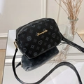 Crossbody camera bag in black printed pattern with gold logo and long shoulder strap - Print Black