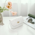 White quilted faux leather square shoulder bag with gold oval twist lock and strap - White