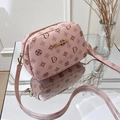 Pink monogram crossbody camera bag with gold hardware and textured leather strap - Printed Pink