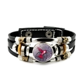 Close-up of woven leather hummingbird bracelet with glass charm and vintage metal beads - Red Hummingbird with Scrolls (JY008557-7)
