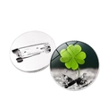 Detail of round green clover brooch with glass dome and secure metal safety pin back - Silver Style 3