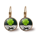 Macro shot of lever-back earrings featuring green lucky four-leaf clover pattern in glass - Antique Bronze Fresh Natural Green Leaf Style (Bronze-3)