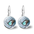 Detailed close-up of silver leverback earrings with blue butterfly glass cabochon inserts - Silver-Blue Green Butterfly Style 12