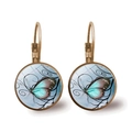Detail view of retro bronze butterfly earrings with blue glass gem and floral vine patterns - Bronze-Light Blue Art Butterfly Style 12