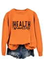 Dettaglio dello slogan Mental Health Matters stampato su una felpa girocollo arancione - S / Arancione (Font Nero)