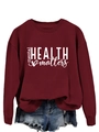 Detail of burgundy sweatshirt featuring mental health matters text and heart graphic print - Wine Red (White Font)