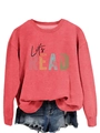 Close-up of brick red crewneck sweatshirt featuring Let's READ artistic letter print - Red (Black Text)