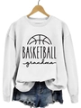 White crewneck sweatshirt with black Basketball Grandma print and denim shorts on hanger - White Sweatshirt (Black Font)