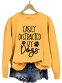 Bright yellow crewneck sweatshirt with 'Easily Distracted by Dogs' print and paw motifs - Yellow Sweatshirt (Black Font)