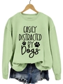 Mint green crewneck sweatshirt with black easily distracted by dogs print design - Olive Green Sweatshirt (Black Font)