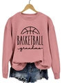 Dusty rose crewneck sweatshirt featuring Basketball Grandma print on a wooden hanger - Rose Gold Sweatshirt (Black Font)