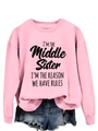 Detail of pink crewneck sweatshirt featuring I'm the Middle Sister slogan print - Pink (Black Print)